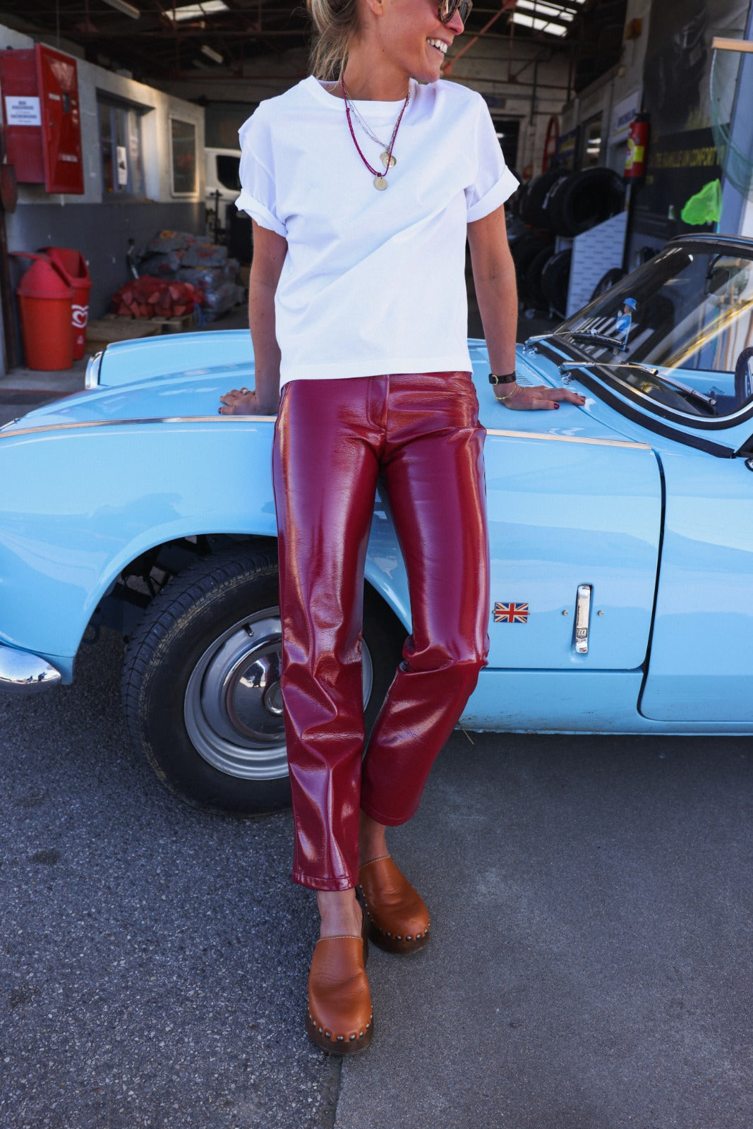 BRUNE red vinyl pants