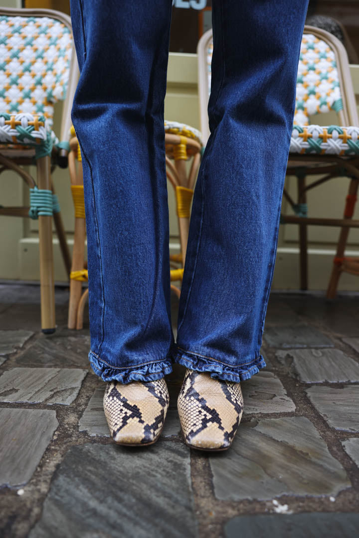 LAZARE ruffle-trim jeans